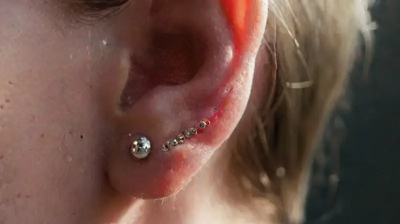 Close-up of pierced ear with jewelry