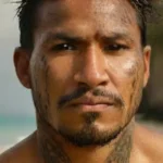 Muscular Polynesian man with detailed tattoos