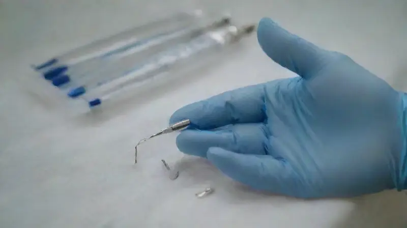 Professional piercing under sterile, detailed conditions