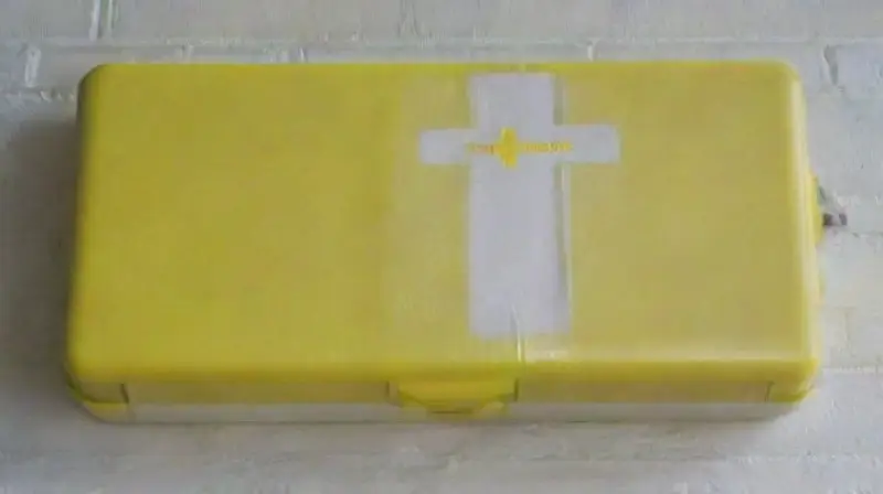 Yellow warning sign with emergency response equipment
