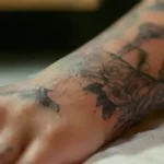 Close-up of detailed tattoo being inked