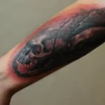 Fair-skinned man with detailed tattoo art