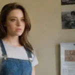 Girl listens to tattoo artist in clinic