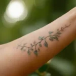 Vibrant nature tattoo on arm with details