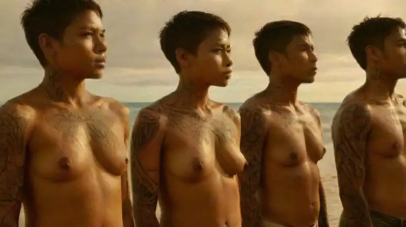 Pacific Islanders with tattoos celebrate cultural traditions