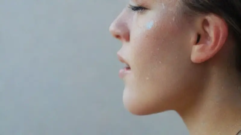 Close-up of realistic niobium ear piercing