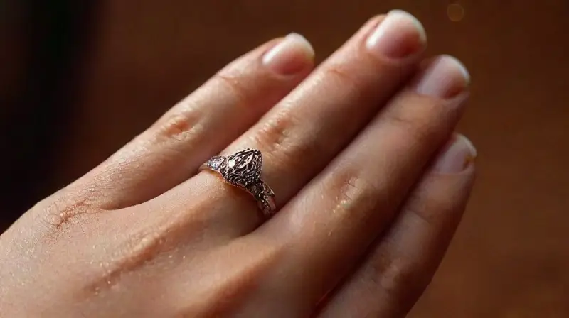 Detailed, realistic hand with ornate jewelry