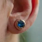 Close-up of pierced ear with jewelry