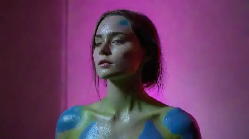 Vivid UV body art in dim light